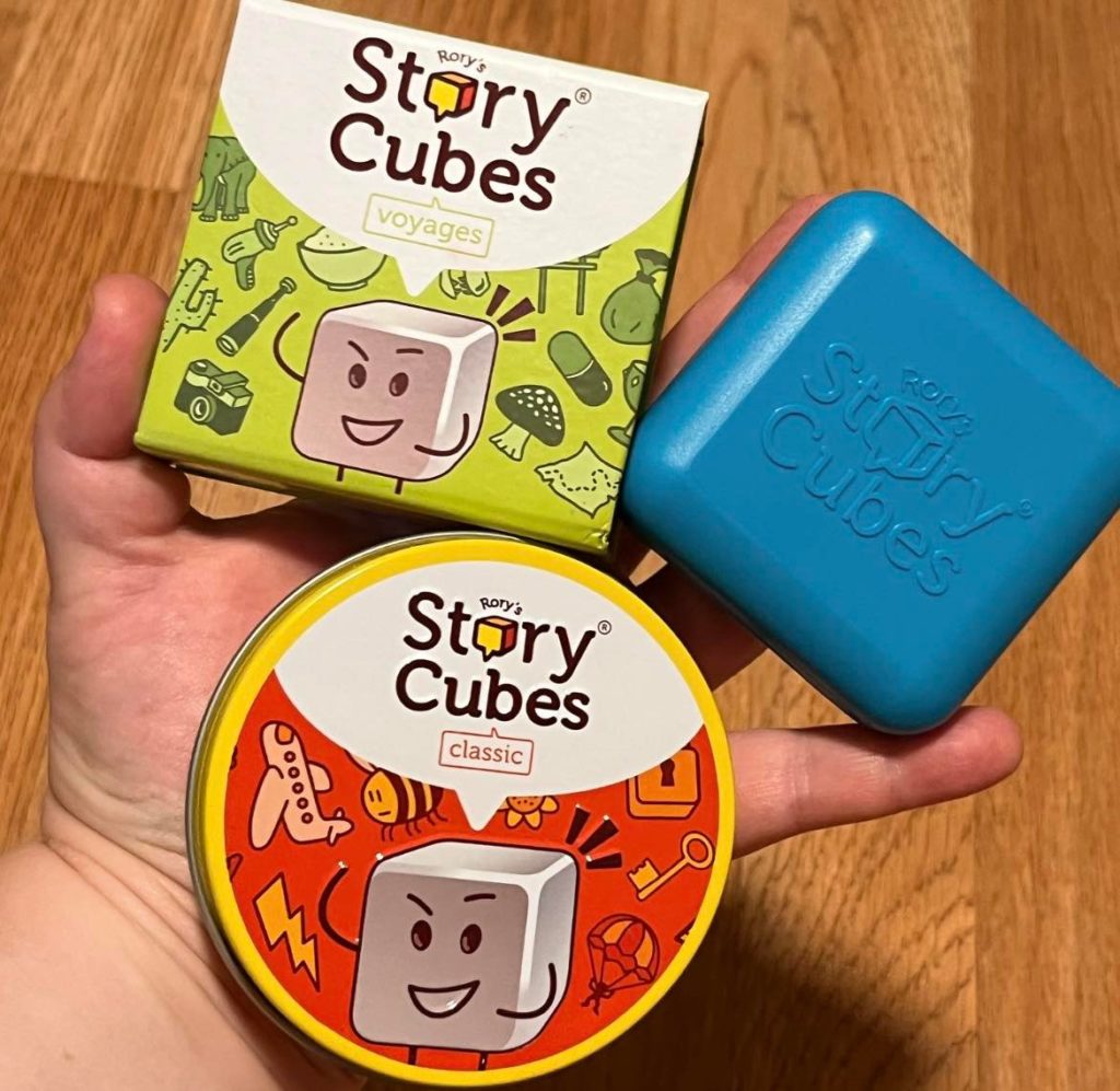 3 packs of story cubes: voyages, actions, and classic